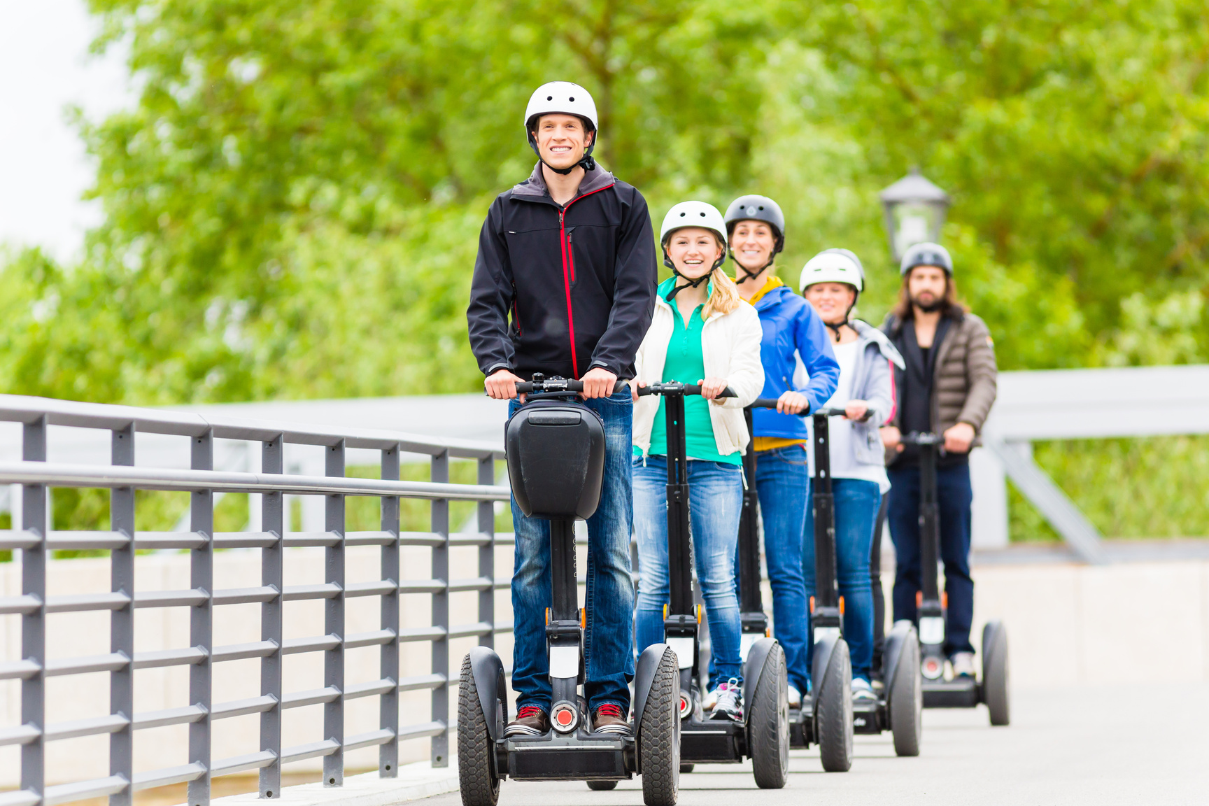 Tourist Group Driving Segway at Sightseeing Tour